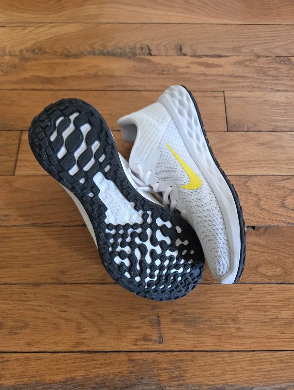 Nike White Revolution Athletic Sneakers with Yellow Swoosh Womens Size 7.5